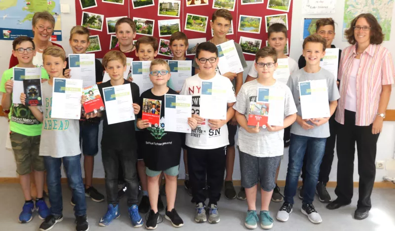 Inspiring teachers: group reading radio play in Germany class